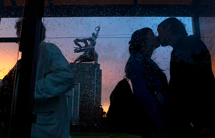 24 hours:  A couple kiss at a tram stop in Moscow