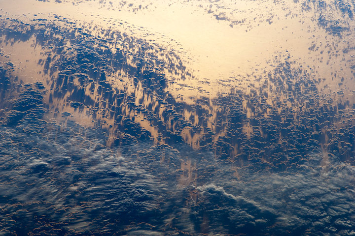 Satellie Eye on Earth: Setting sun highlights cloud patterns