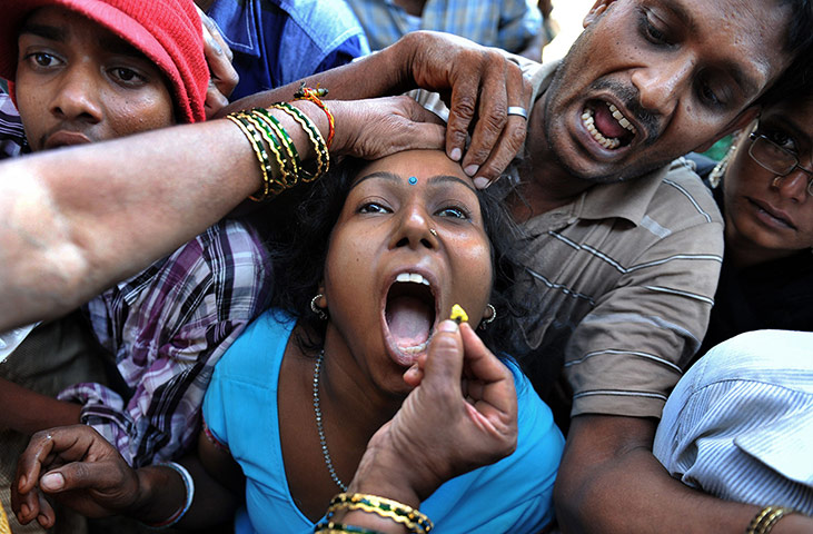 Picture desk live : A member of the Bathini Goud family 