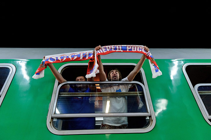 Picture desk live: The first train with Russian fans arrives in Terespol, Poland