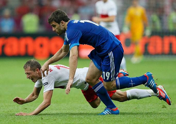 Euros opening ceremony: Greece's Papastathopoulos fouls Poland's Murawski 