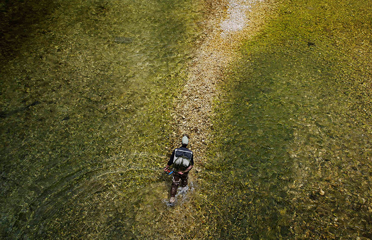 24 Hours: A competitor in River Sava during the World Fly Fishing Championship