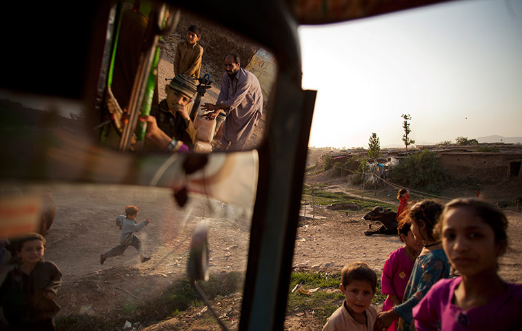 24 Hours: Pakistani children play in the slums of Islamabad