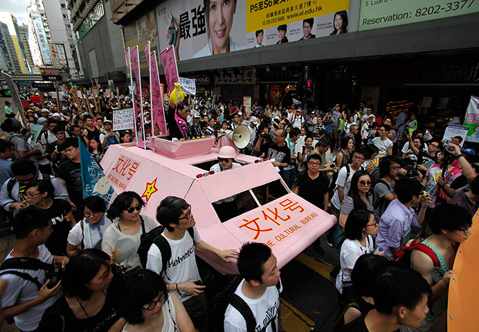 Hong Kong demonstrations: Pro-democracy demonstrators march in downtown Hong Kong