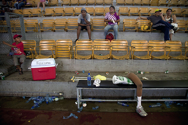 24 hours in pictures: A prosthesis remains on a seat during heelchair Basketball Championship