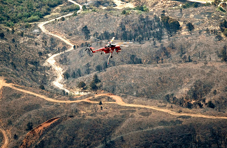 Wildfires in Colorado: A helicopter flies over the aftermath of the Waldo Canyon Fire