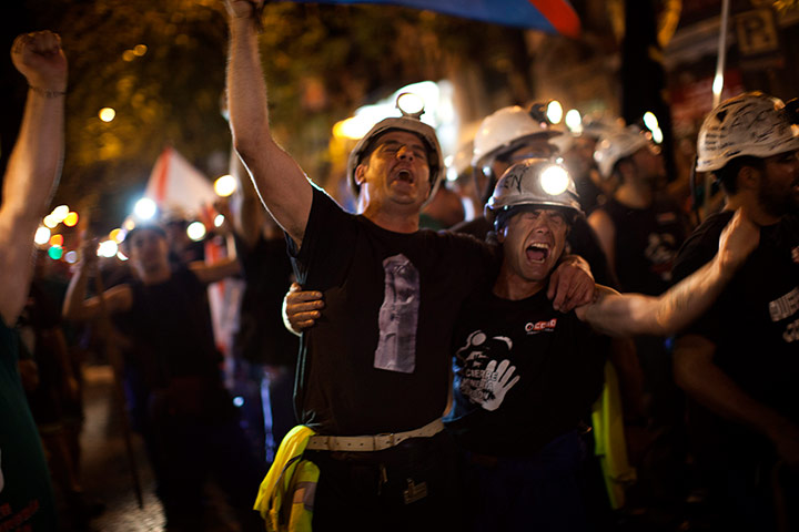 Picture desk live: Protesting coal miners sing on their protest march to Madrid