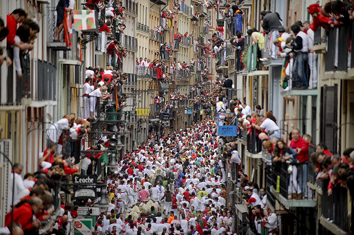 Picture desk live: the fifth day of  the San Fermin Festival bull run in Pamplona