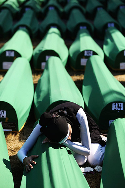 Picture desk live: A scene at the Memorial Centre in Potocari before a mass burial
