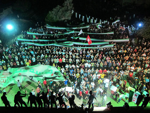 Picture desk live: People protest against Syria's President Bashar al-Assad in Damascus