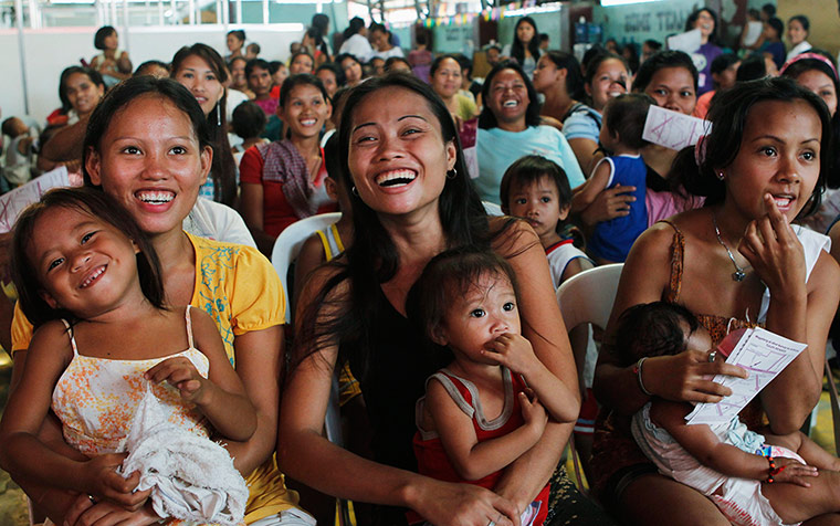 Picture desk live: People take part in a family planning session in Manila