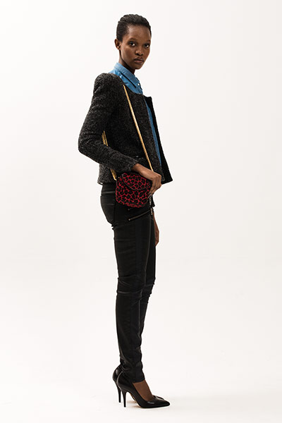 All Ages: Model wears a dark grey tweed jacket and jeans