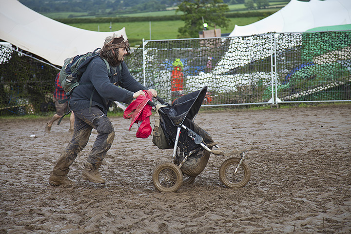Wet festivals update: stroller through the mud at Sunrise Celebration Festival in Somerset