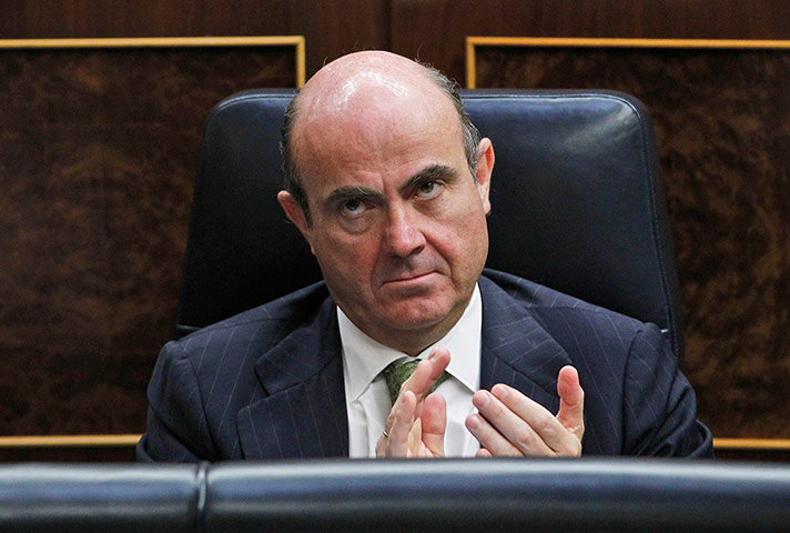 Picture desk live: Spain's Economy Minister listens to the Prime Minister speak in Parliament