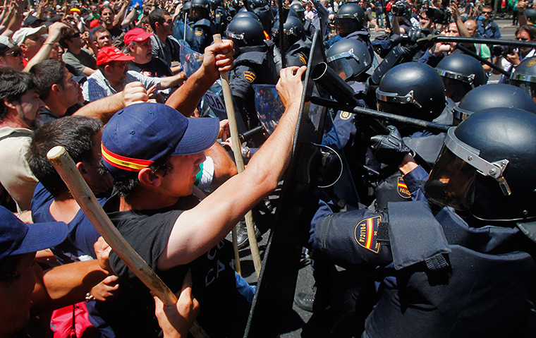 Miners reach Madrid: Demonstrators clash with riot police during the coal miner's march 