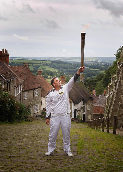 Picture Desk Live: Day 55 - Olympic Torch Relay