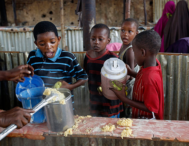 Mogadishu: A boy reacts during food distribution by an international NGO in Mogadishu