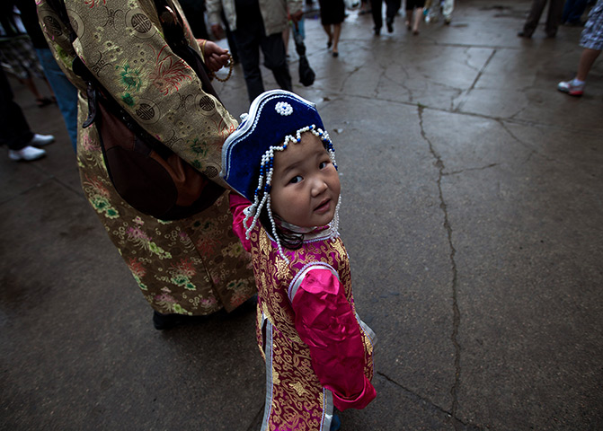 24 hours: Ulan Bator, Mongolia: A Mongolian child in a traditional costume 