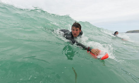 Hand planing in Watergate Bay, Cornwall