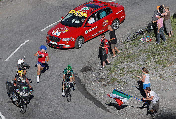 tour de france: Pierre Rolland gets some encouragement on as he climbs towards La Toussuire