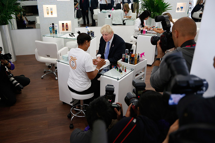 Olympic Village: London mayor Boris Johnson visits a salon