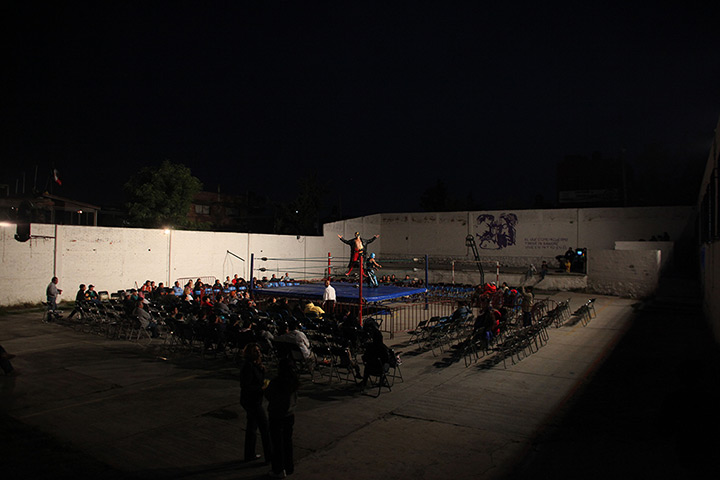 Lucha Libre, Mexico: Lucha Libre wrestler performs on a makeshift wrestling ring in a schoolyard
