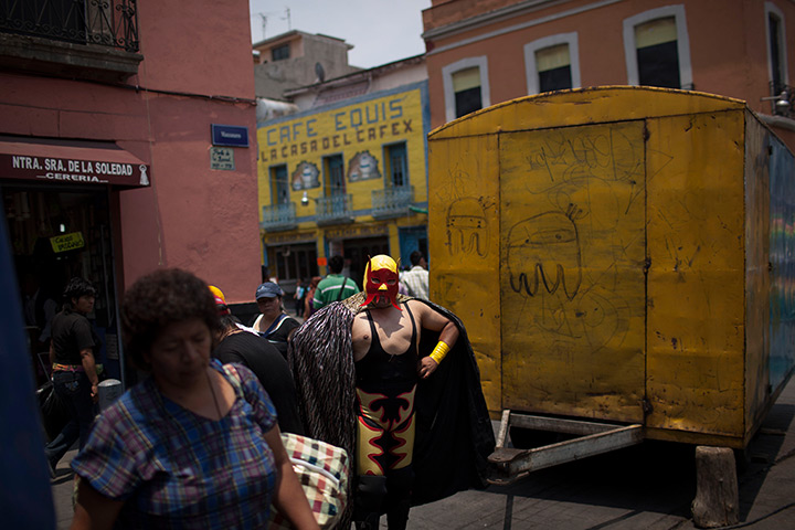 Lucha Libre, Mexico: Lucha Libre wrestler poses for fans as he walks towards a makeshift ring