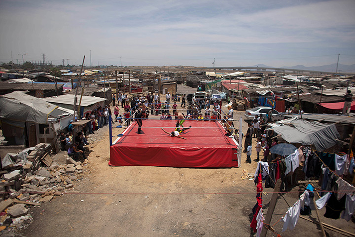 Lucha Libre, Mexico: Fans watch Mexican Lucha Libre wrestlers on the outskirts of Mexico City