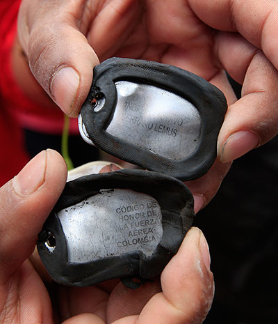 FARC in Colombia: Identification tag of Andres Serrano from plane farc claim shot down