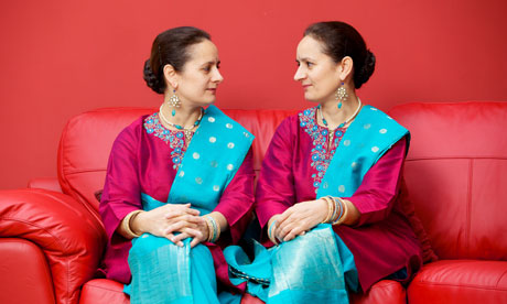 Identical twins in saris