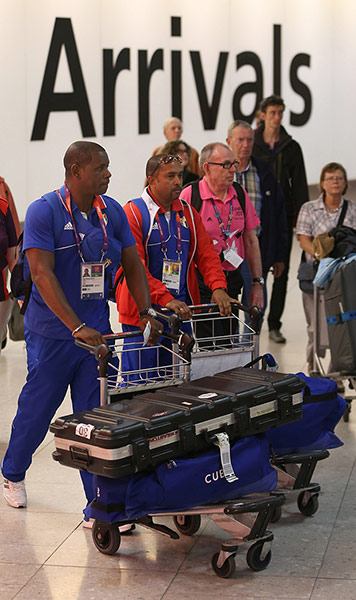 Picture desk live: Members of the Cuban Olympic team arrive at Heathrow