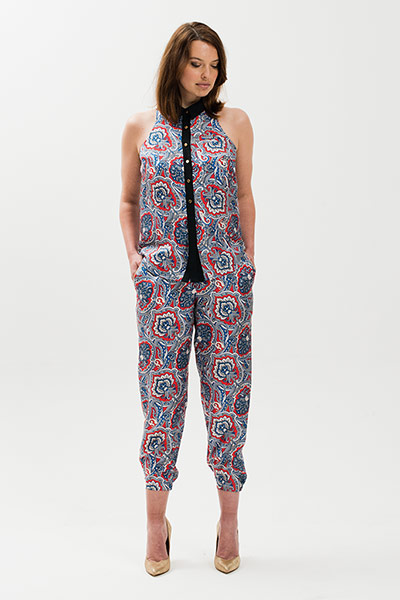 All Ages: Model wears matching patterned satin blouse and trousers