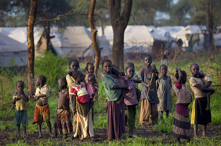 Picture desk live: Refugee children stand near their tents in Jamam refugee camp, South Sudan