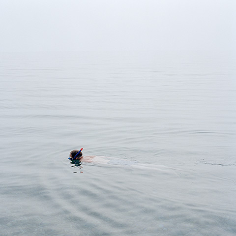 RPS print exhibition: Snorkeler. This photograph is of a man snorkeling off the isle of Portland