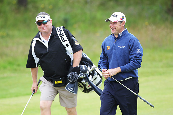 Lee Westwood: Relaxed Lee Westwood with his caddie on the 3rd