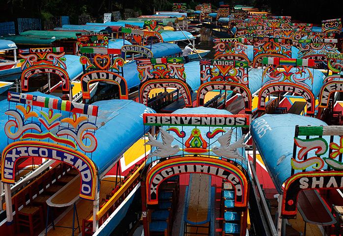 24 hours: Mexico City, Mexico: Trajineras (boats) are parked at one of the canals