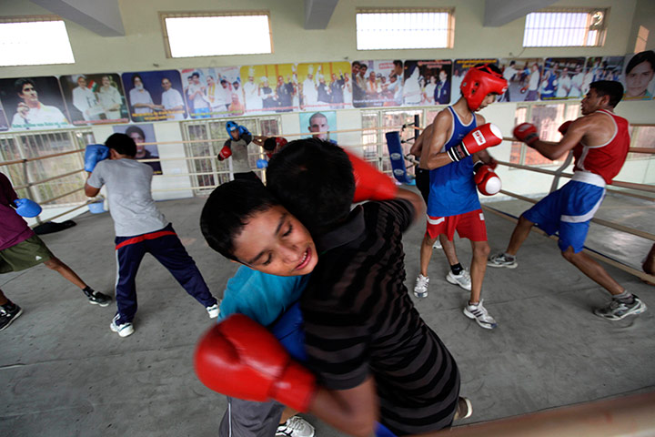Boxing in India: Himanshu fights during a training session at the Bhiwani Boxing Club 