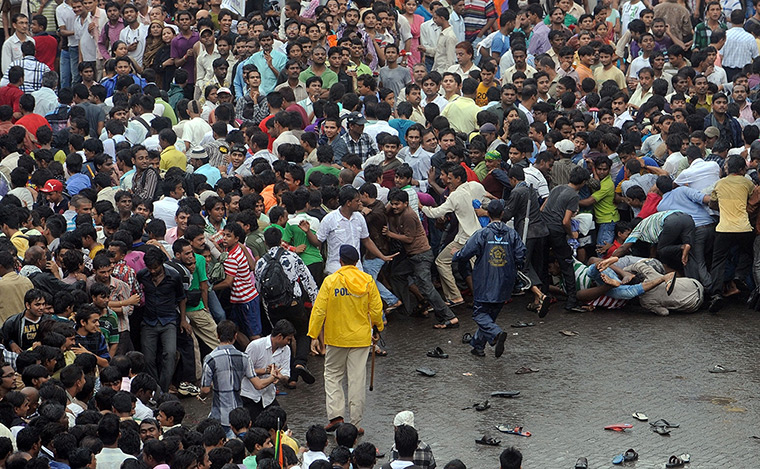 Rajesh Khanna funeral: Indian police try to control a huge crowd during a funeral procession