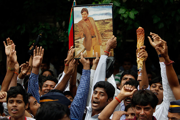 Rajesh Khanna funeral: Fans hold a photograph of Bollywood superstar Rajesh Khanna