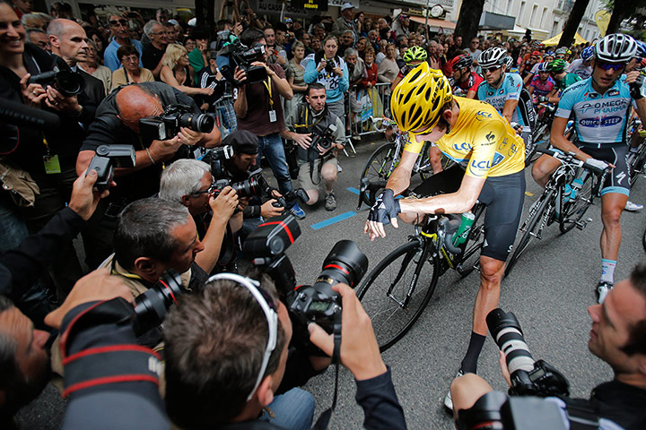 stage 17: Photographers crowd around Bradley Wiggins