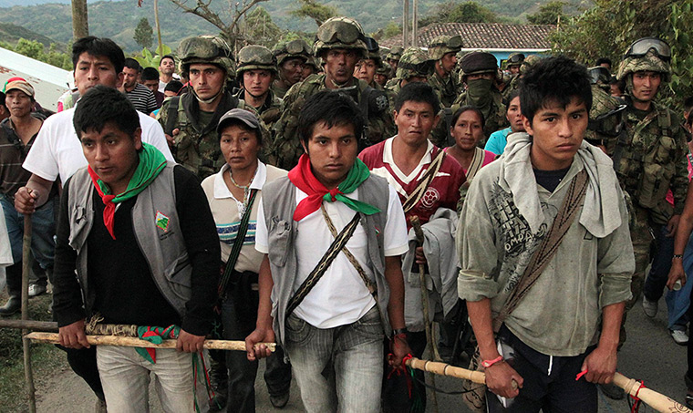 Colombia unrest: Indigenous residents escort Colombian soldiers 
