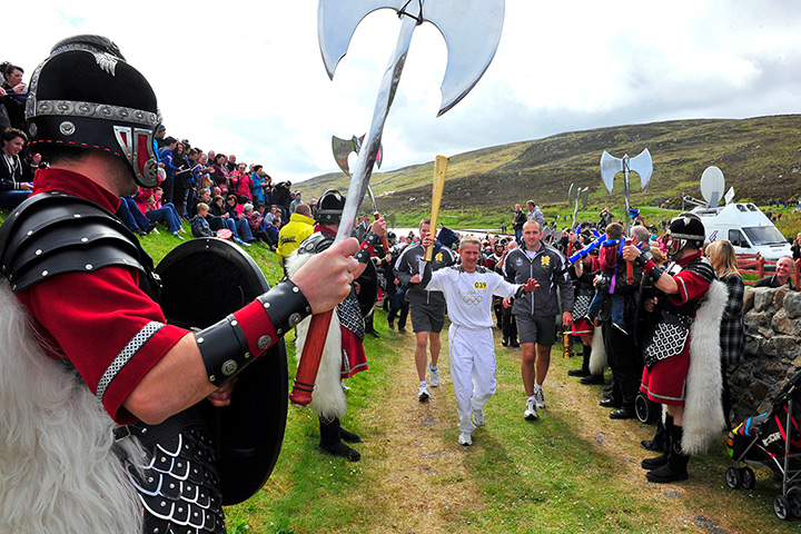 Torch relay: 10 June, Lerwick, Shetlands: Volunteer swimming coach Matthew Cox