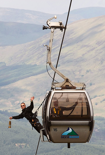 Torch relay: 9 June, Nevis range: An employee of the Nevis Range