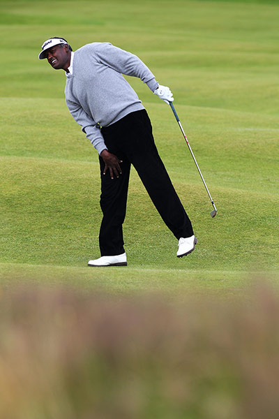 Open Golf day 1: Vijay Singh keeps an eye on his ball on the 3rd