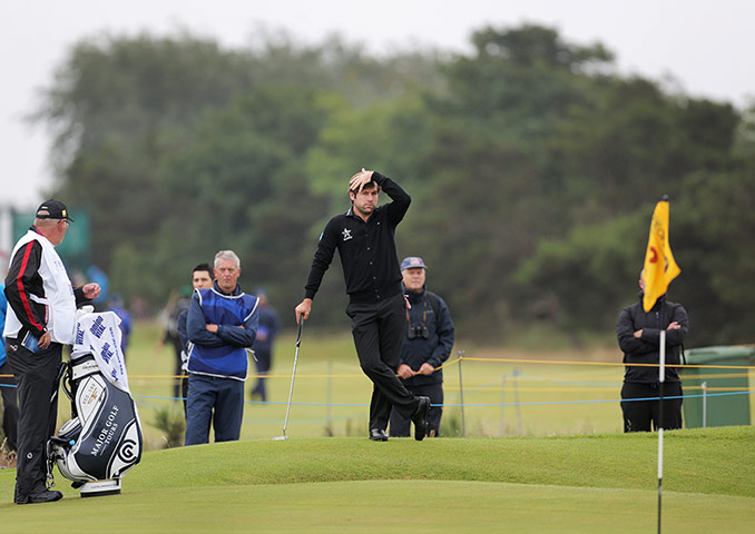 Open Golf day 1: Robert Rock strikes a pose as he waits to play