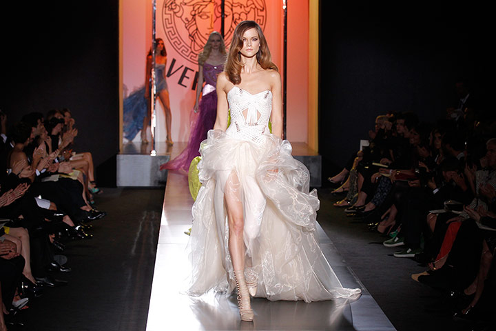 Versace guests: A model presents a creation by Versace 