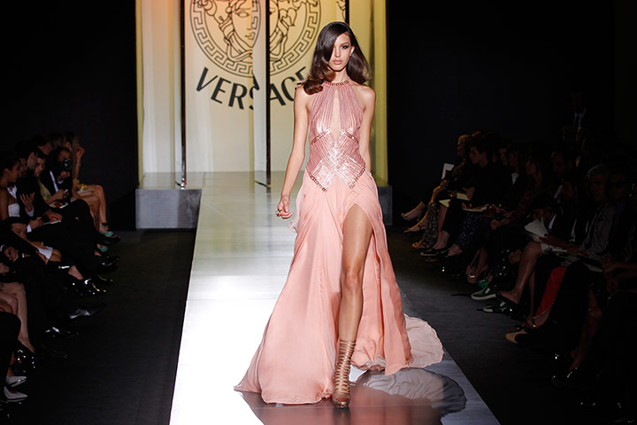 Versace guests: A model presents a creation by Versace 