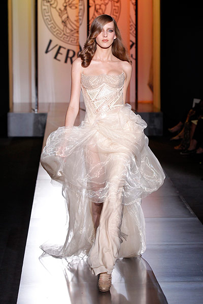 Versace guests: A model presents a creation by Versace 