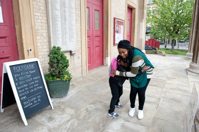 Foodbank gallery: 9 Woman hugging child