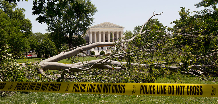 US storms: A tree lies on Capitol Hill grounds in Washington